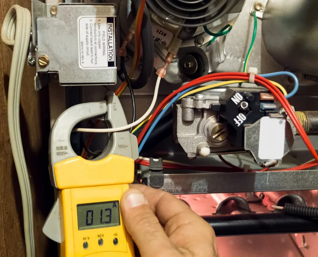 Premier Heating & Air HVAC Technician providing Energy-Efficient Solutions for Your Furnace in springfield il