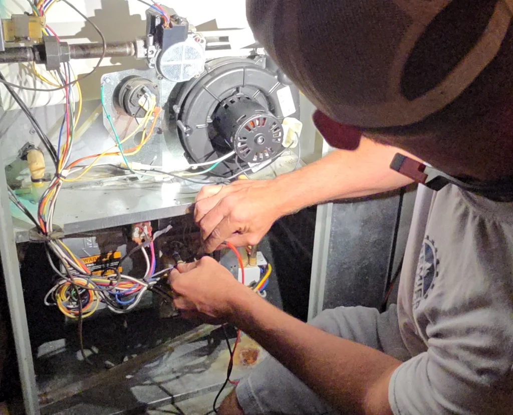Premier Heating & Air HVAC Technician providing Full-Service HVAC Solutions in Chatham IL